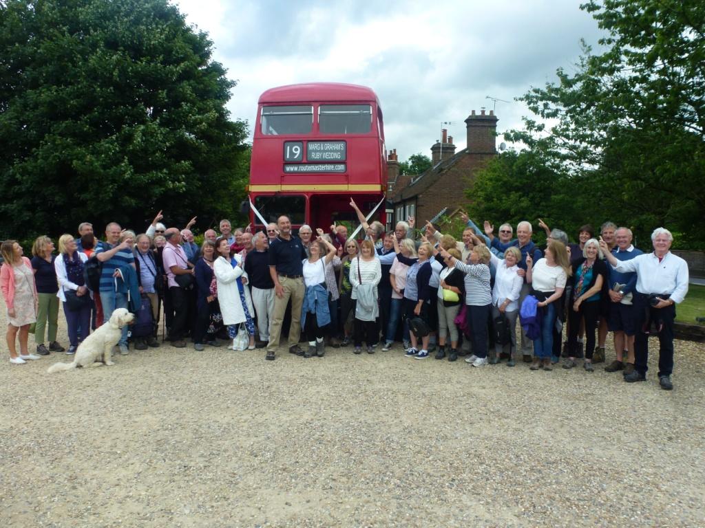 graham wood and his guests pictured in front of route-master hire red London bus